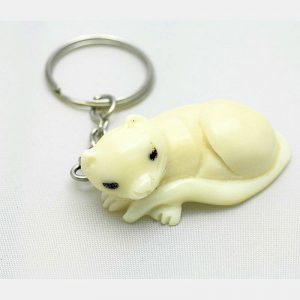 Porte clé chat couché tagua