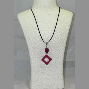 Pendentif design tagua teintée violet