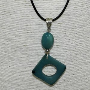 Pendentif design tagua teintée bleu