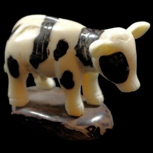 Vache taillée dans la gaine de tagua